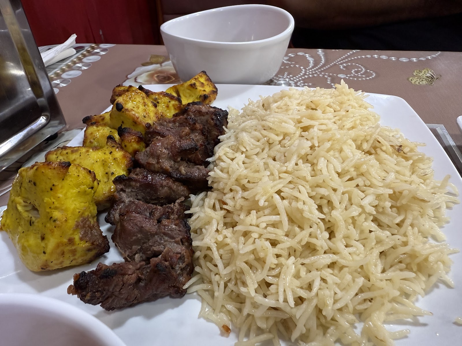 Fresh Afghan bread and dishes prepared at Afghan Kabab House